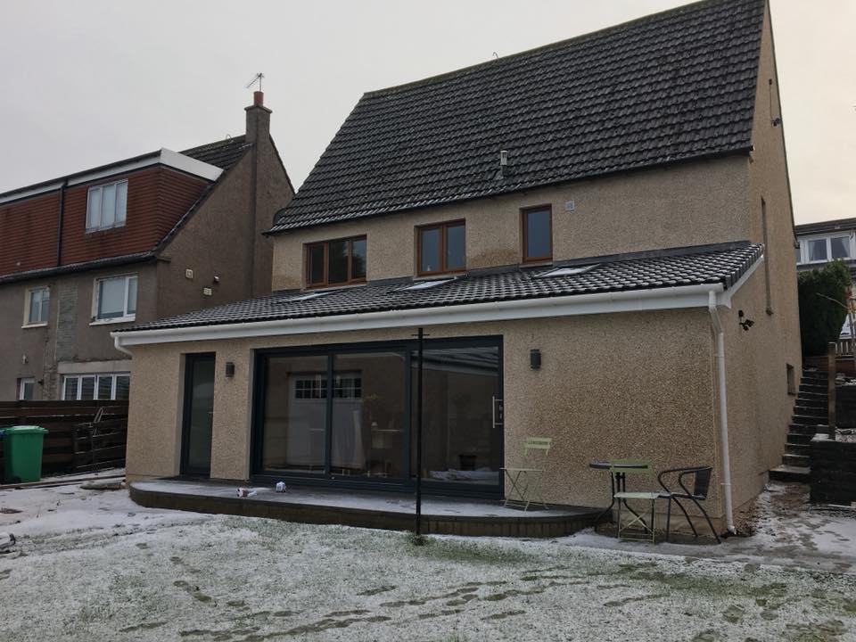 House extension, The floor has underfloor heating installed and all external walls were fully insulated. We fitted a three part aluminium sliding door which along with the three velux let’s plenty of light in to the new open plan kitchen/ living room . The downstairs also has a new utility room with cloakroom toilet and a new playroom in Garvock, Dunfermline