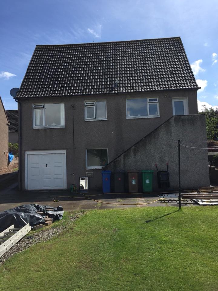 House extension, The floor has underfloor heating installed and all external walls were fully insulated. We fitted a three part aluminium sliding door which along with the three velux let’s plenty of light in to the new open plan kitchen/ living room . The downstairs also has a new utility room with cloakroom toilet and a new playroom in Garvock, Dunfermline
