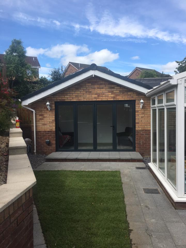 Single storey Garden room extension with downstairs toilet and shower room with single garage to the front In Dunfermline