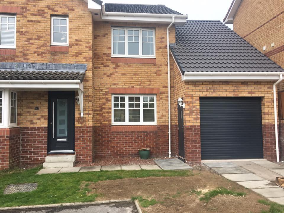 Single storey Garden room extension with downstairs toilet and shower room with single garage to the front In Dunfermline