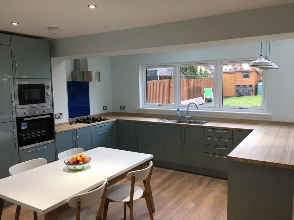 Single storey sunroom extension with removal of load bearing walls and installation of steel beam to create open plan living